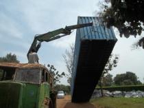 The container is unloaded in Uganda.