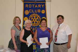 President Kate Dame and Treasurer Chuck Moran welcome newest Dracut Rotarians, (center l) Renee Plummer and (center r) Nanci Hill.