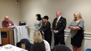 President Frank leads the Induction Ceremony for new members Ann Tinnirella, Gerogianna Kotsironis, Dan Cotnoir and Lisa Benoit. 